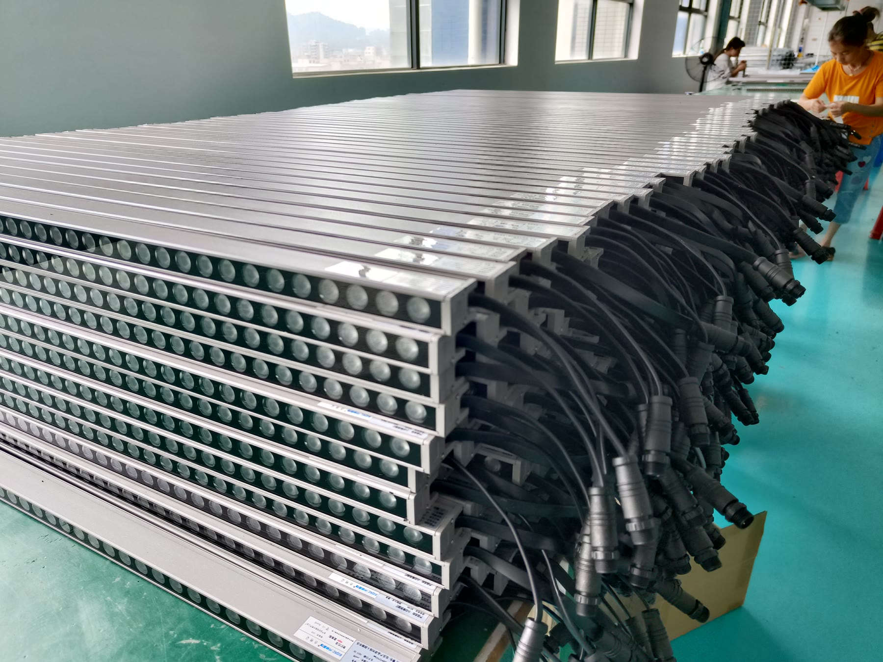 Linear lighting products arranged in production batches