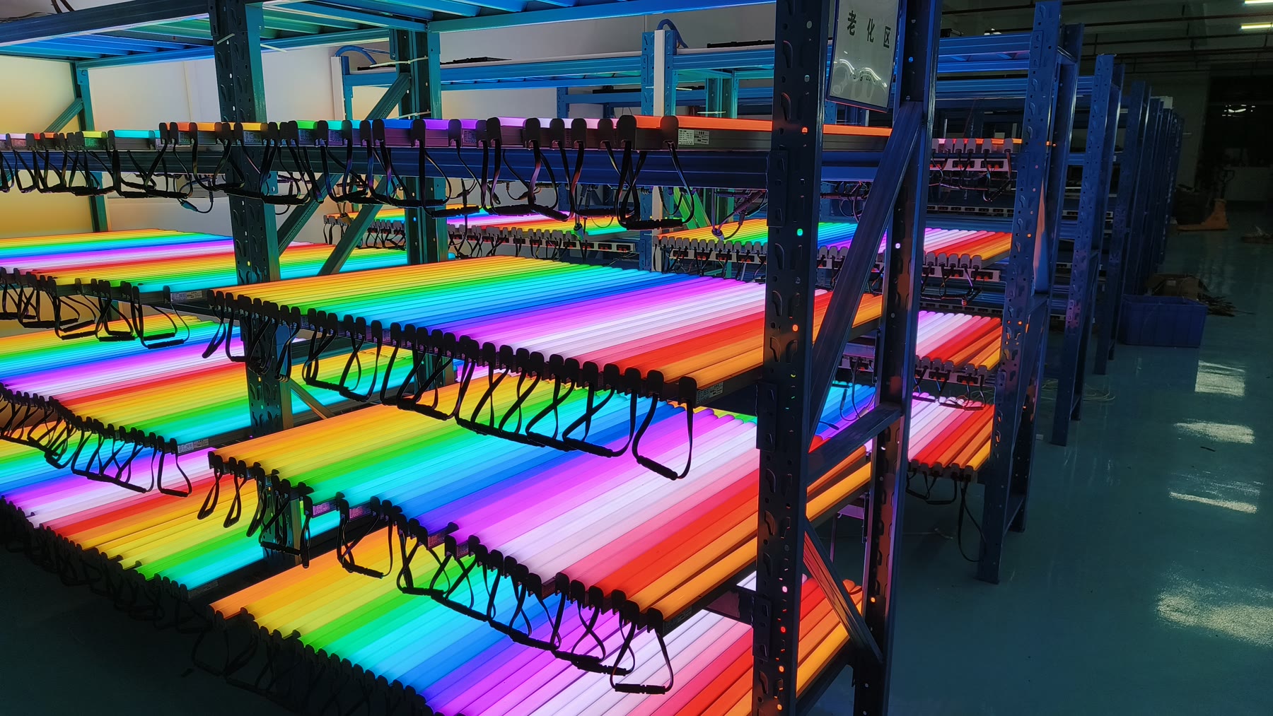 RGB fixtures illuminated on testing racks