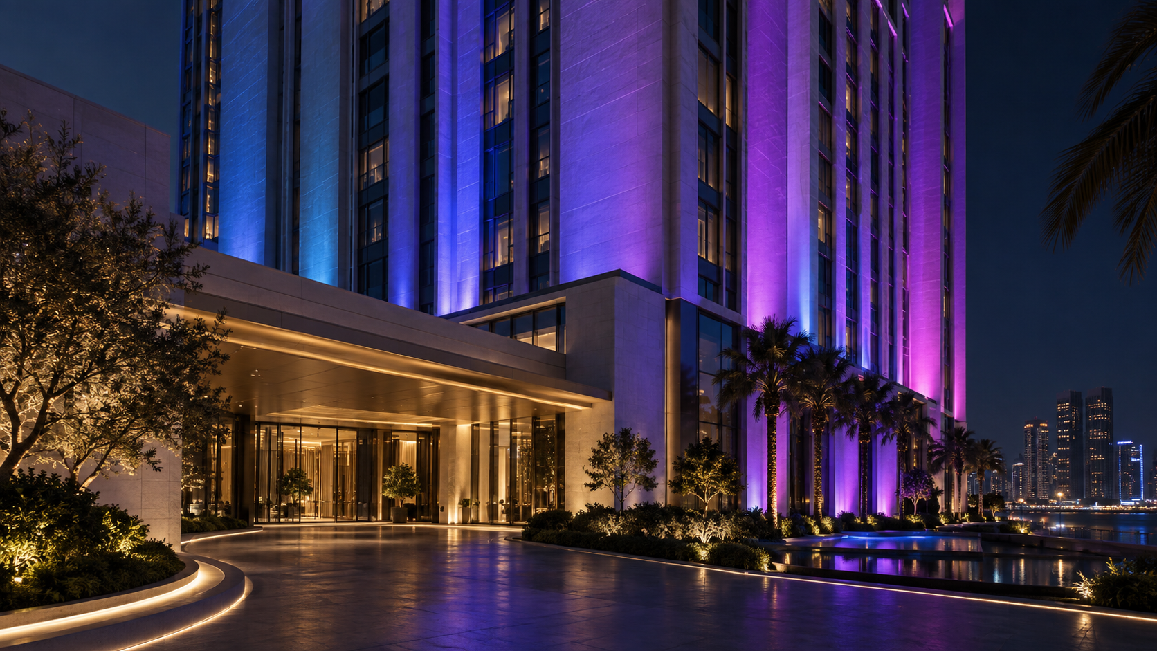 Application illustration — continuous RGB wall washing across a hotel facade.