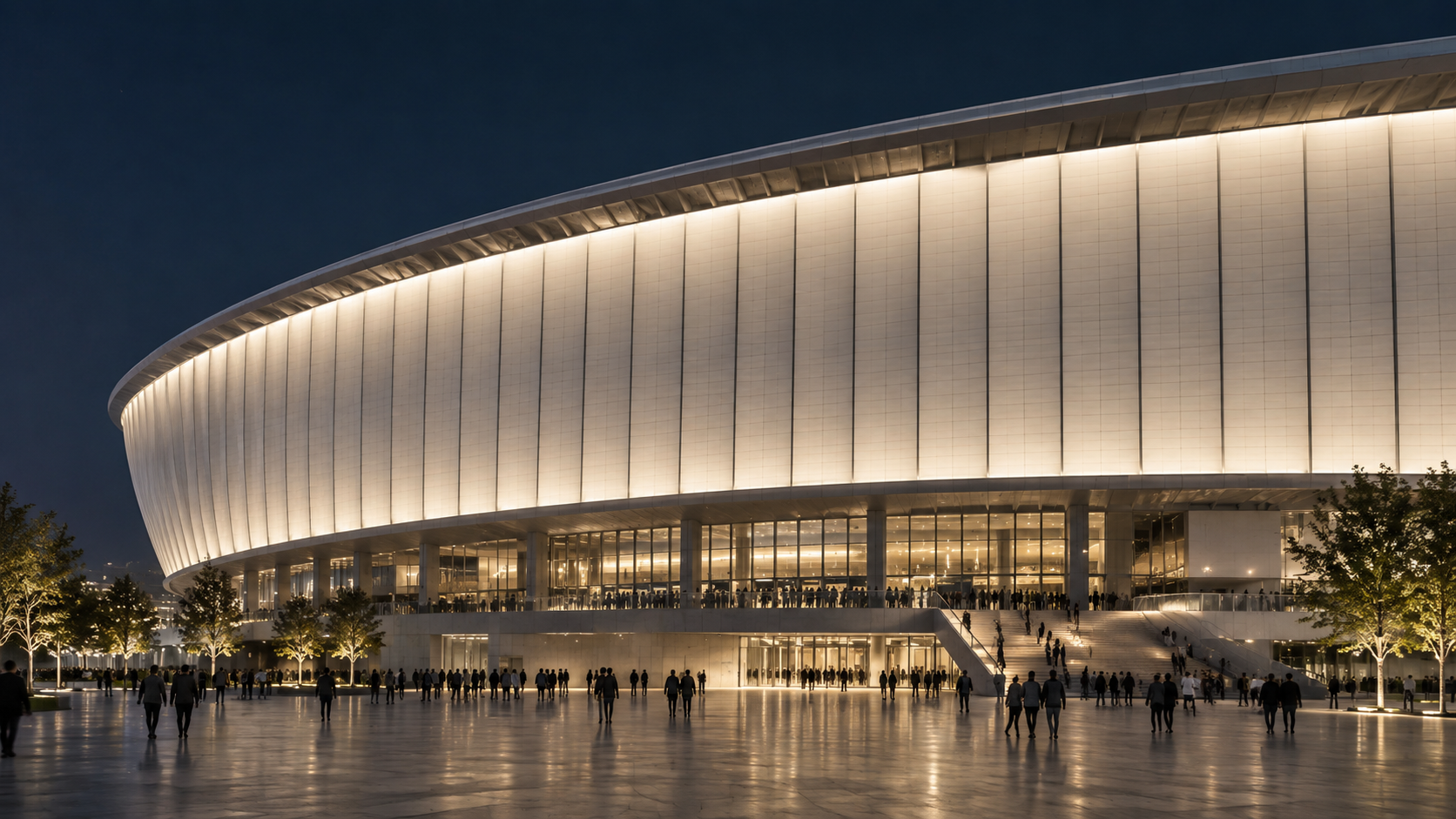 Application illustration — continuous neutral-white wall washing across a stadium facade.
