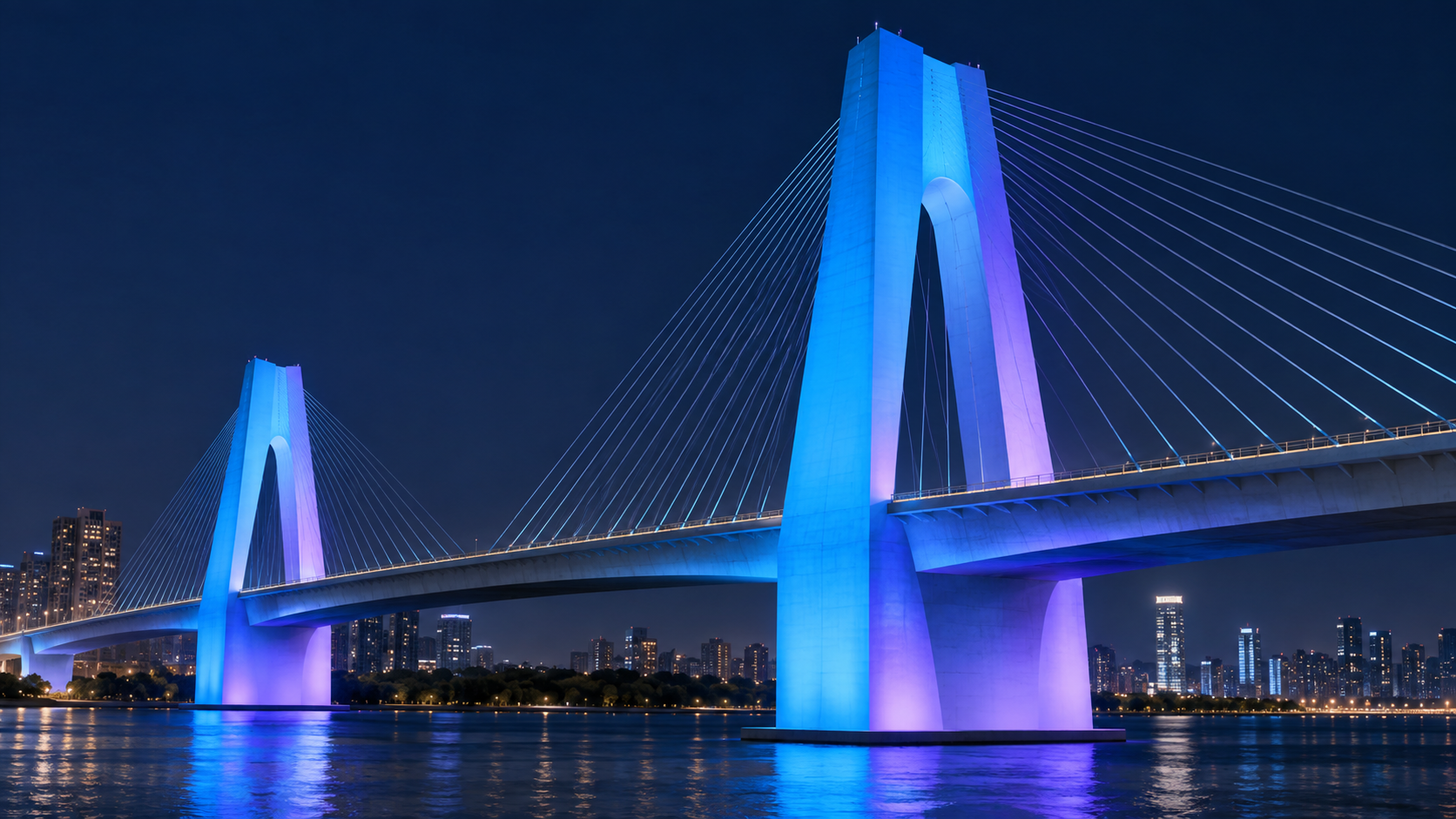 Application illustration — continuous RGB wall washing across bridge piers and structural surfaces.